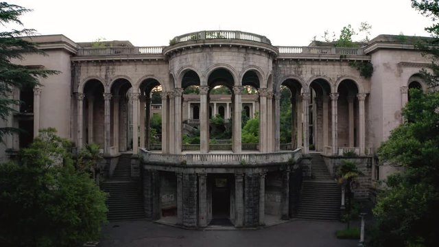 The ruins of the old Soviet sanatorium, whose architecture which is basically a synthesis of Stalinist period classical style and of Georgian ethnic decor with Gothic and Roman features.