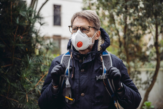 Matuer Man Commuting In The City, Wearing Protective Mask