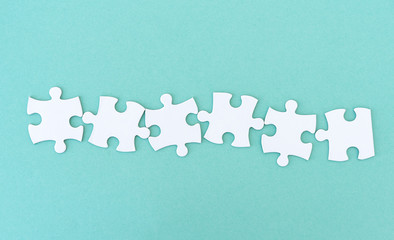 Jigsaw puzzle pieces in a row for inscription, 6 pieces