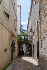 Fototapeta premium Narrow streets of the old city in Budva