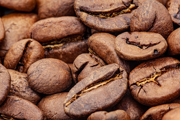 Obraz premium Coffee beans roasted. Macrophoto. Close-up. 
