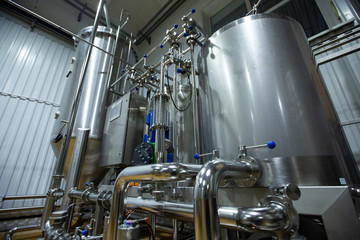 Craft beer brewing equipment in brewery
Metal tanks, alcoholic drink production