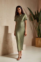 Fashion model brunette hair wear green dots silk dress sandals high heels accessory clothes date...