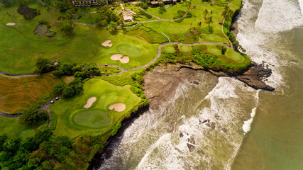 Top aerial view of Tanah Lot temple bay in Bali, Indonesia.