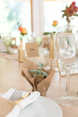 light decor of a festive table in a bright interior