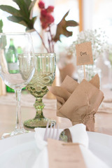 light decor of a festive table in a bright interior