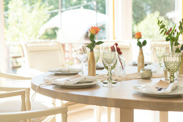 light decor of a festive table in a bright interior