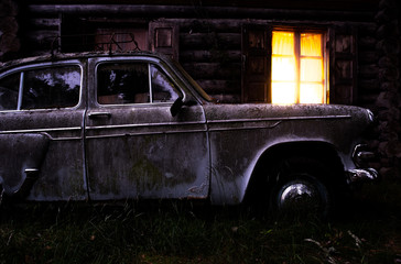 A car parked on the side of a building