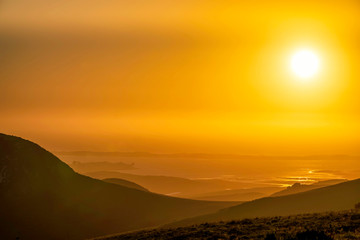 Yellow Sunset over Mountain, Ocean