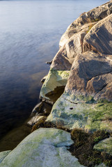 Beautiful stone in different colours in a lake