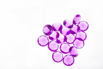 Wide angle view of purple grape shaped bead collection.