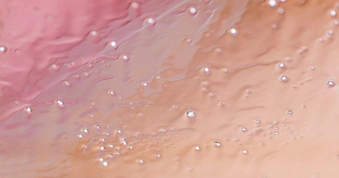 Close-up of sleet falling against a window pane.