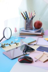School stationery, tablet, phone on the desk, home schooling concept, part interior children's room, back to school