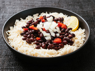 Black Beans and Rice in a black bowl.