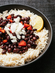 Black Beans and Rice in a black bowl.