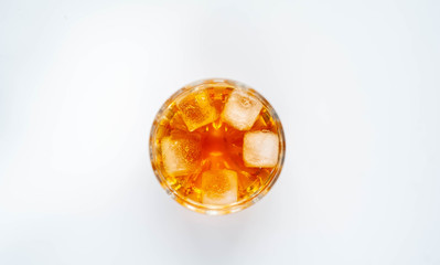 glass with whiskey on a white background