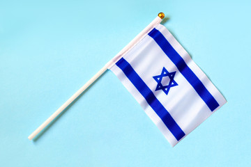 Flag of Israel on blue background. White and blue colors.