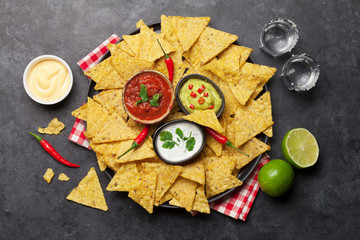Mexican nachos chips and tequila