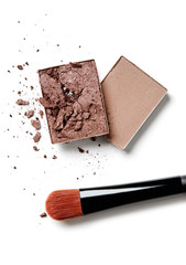 Brown face powders and makeup brush