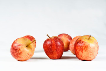 natural and healthy tropical fruit apples on the table on white texture background