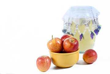 natural and healthy apples tropical fruit inside a yellow pot isolated on bench background.