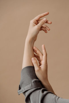 Female hands sensuality and tenderness holding fingers.