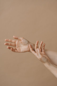 Female hands sensuality and tenderness holding fingers.