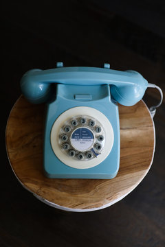 Retro vintage phone on wooden table