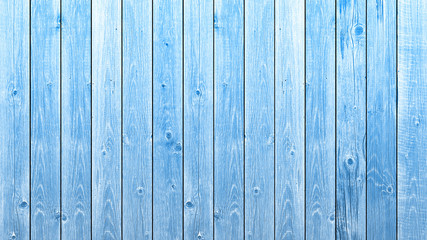 Top view of blue background wooden planks board texture.