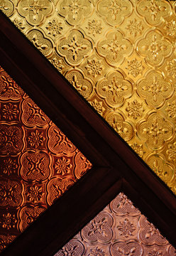 Pattern of Geometric Mosaic Texture on the Glass in Three Colors
