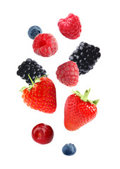 Set of falling sweet berries on white background