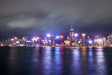 Naklejka premium View of Victoria Harbor and Hong Kong at night. Urban landscape.