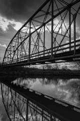 Monochrome Bridge Cloudy Day In November. Reflection