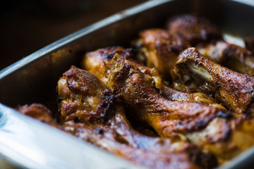 A photo of hot baked marinated chicken legs