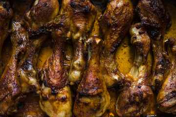 Obraz na płótnie Canvas A photo of hot baked marinated chicken legs
