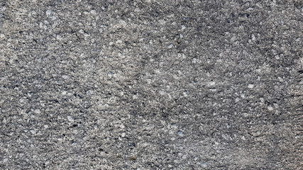 Grungy white concrete wall texture background.