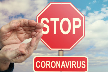 Hands of old woman calling to help and salvation. STOP Coronavirus  SARS COVID-19 danger. 2019-nCoV pandemic. Risk of disease and high mortality in the elderly people. 