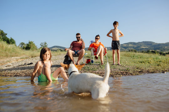 Family enjoying a nice day at the lake