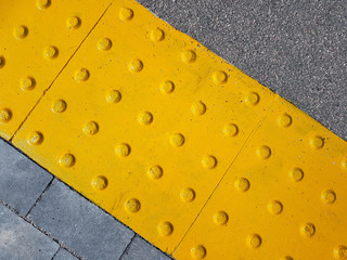 Tactile paving. Dot sign on the floor for blind people