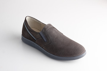 Brown men leather shoe with shoelaces on white background