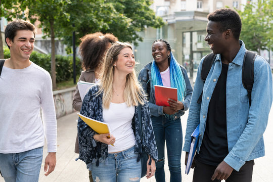 Young friends students together at the college