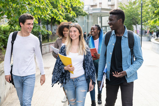 Young friends students together at the college