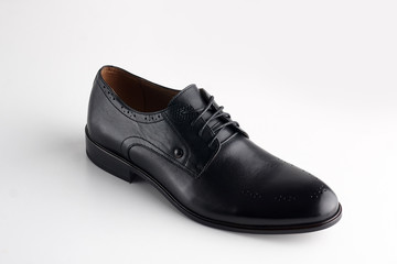 Men fashion black shoe loafer isolated on a white background.