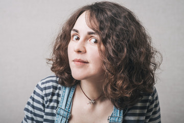 woman overhears dressed in overalls