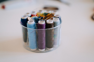 closeup photo of multicolored ribbons to sew