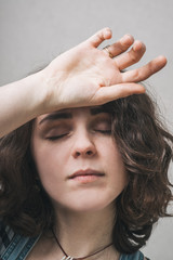 Fototapeta premium the girl's head spin, dressed in overalls