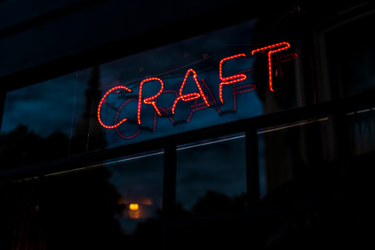 Neon sign out of a bar