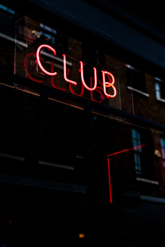 Neon sign out of a bar