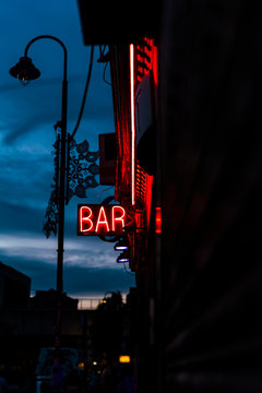 Neon sign out of a bar