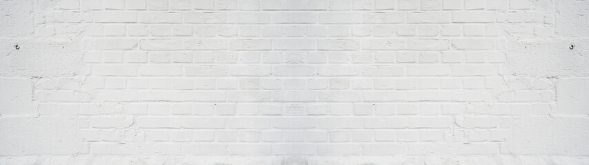 White bright painted damaged rustic brick wall texture banner panorama